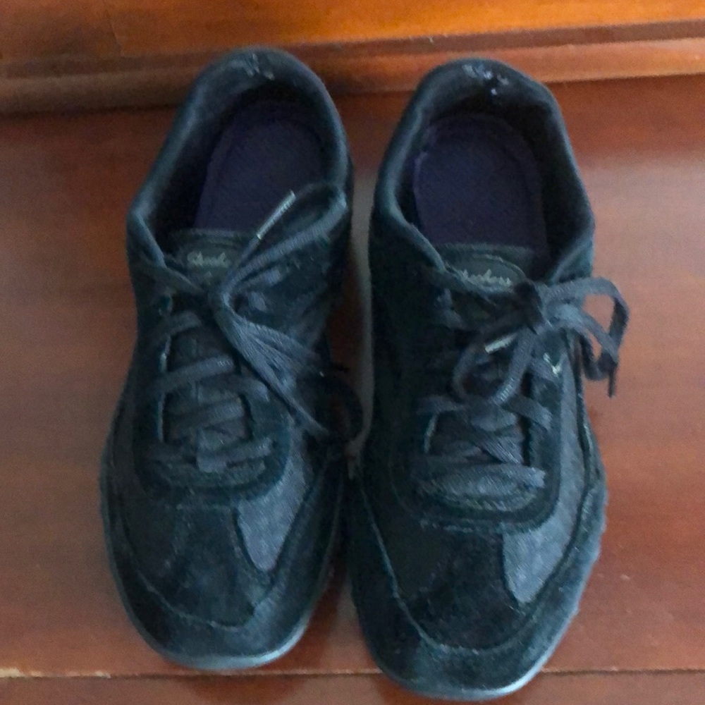 Black suede Skechers